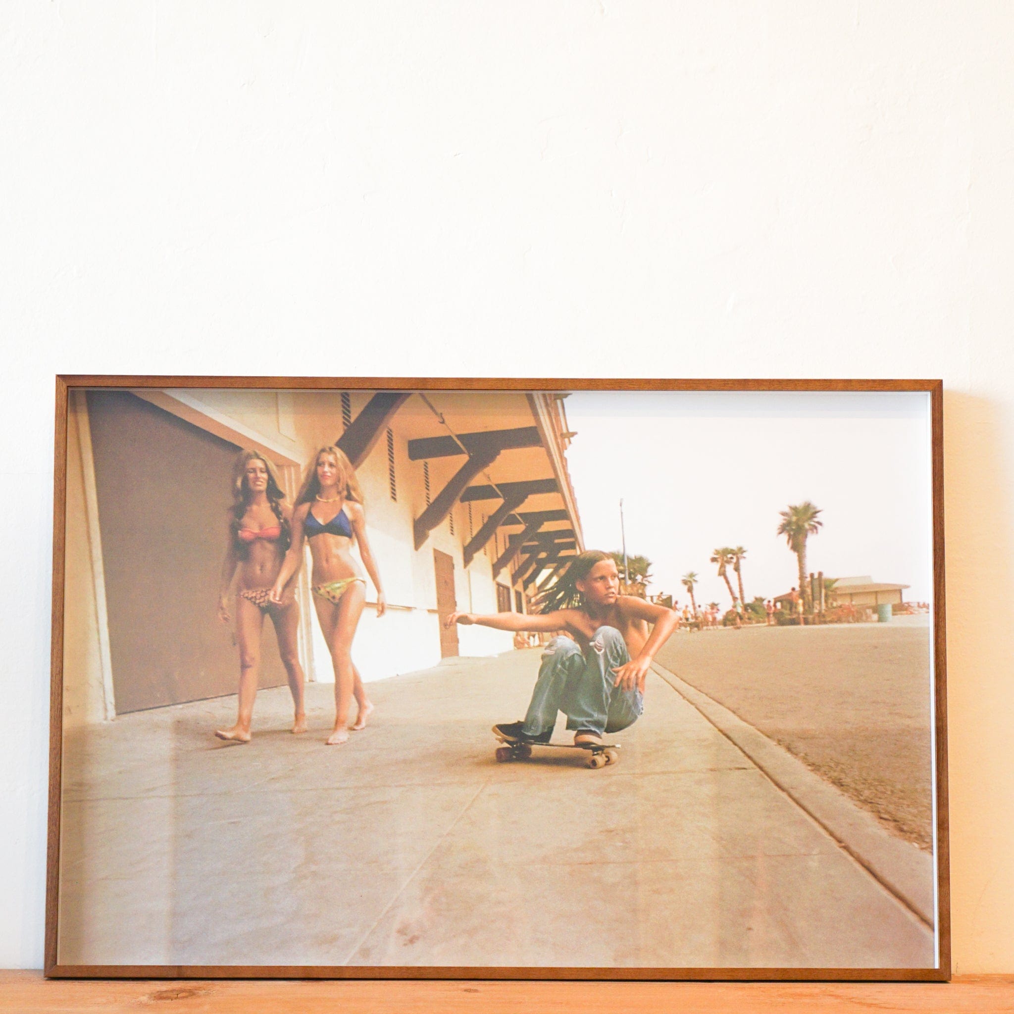 Framed Poster - Sidewalk Surfer, Huntington Beach, 1976 by Hugh Holl