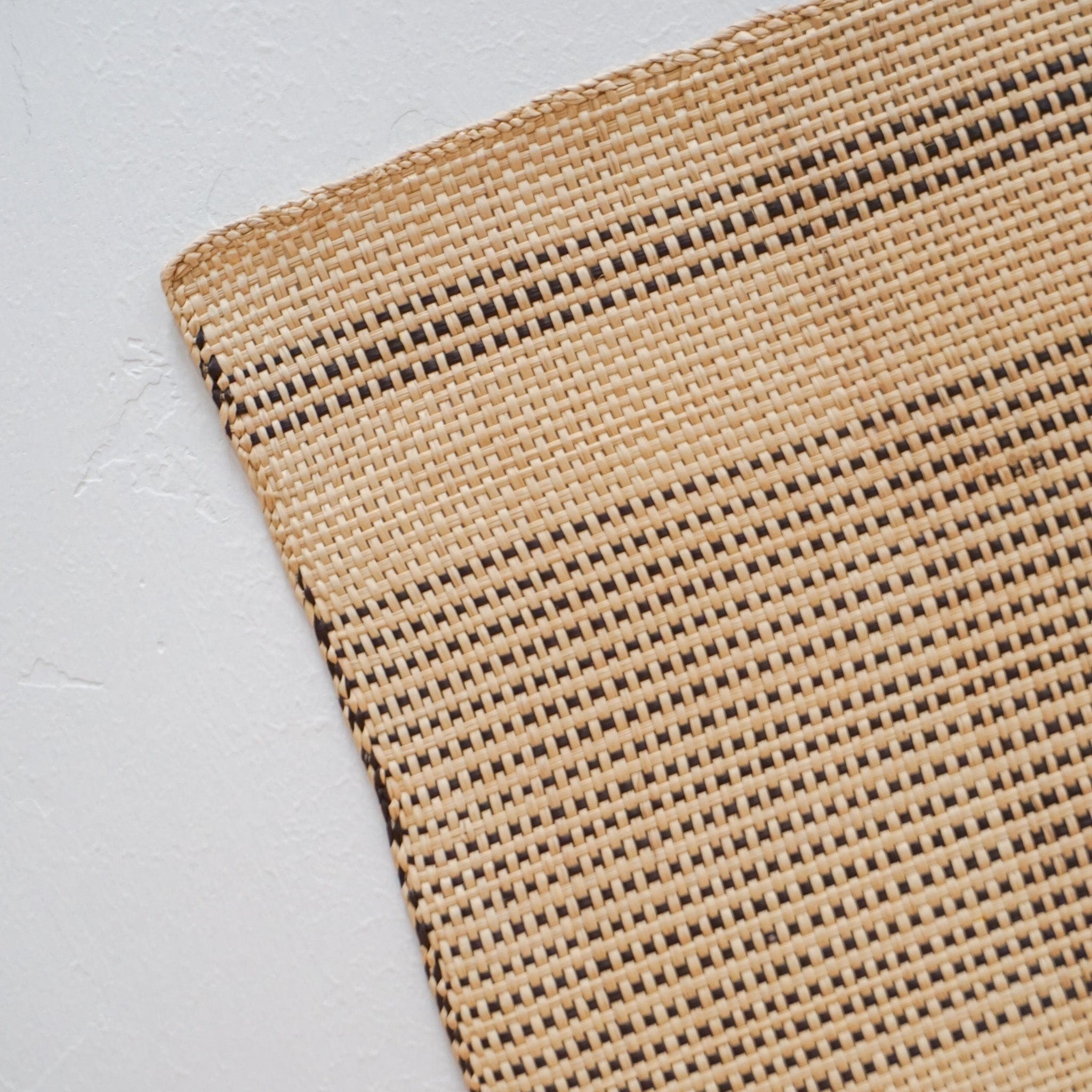 Guanabana Placemats Beige/Black Striped Straw Placemat by Guanabana